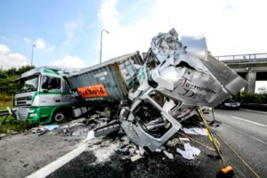 Two trucks badly crashed on a highway